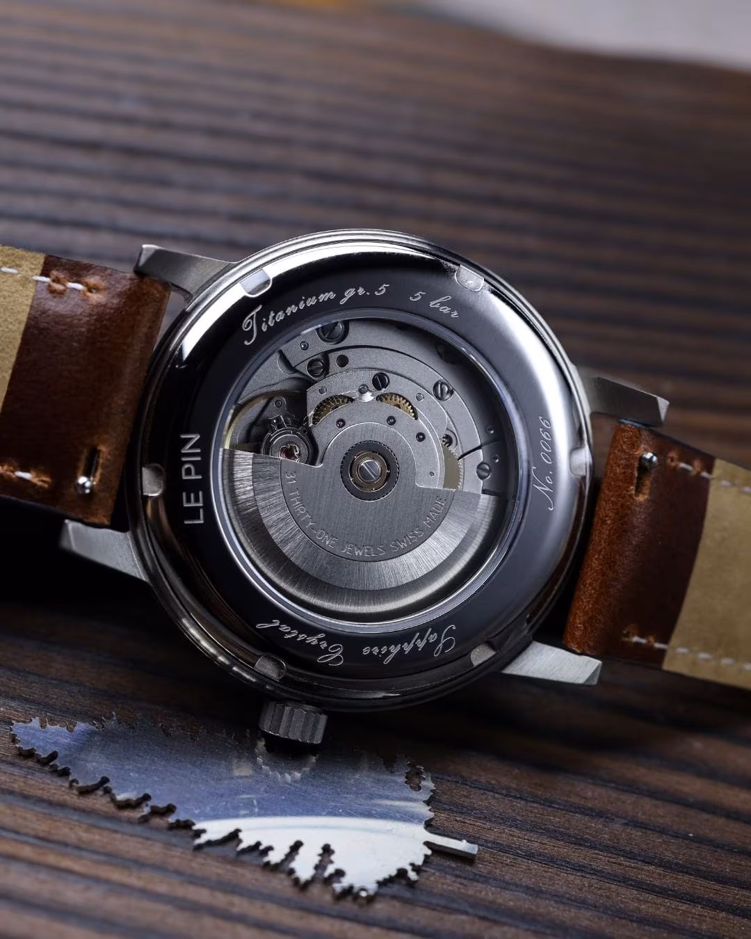 Case back over the Sellita SW261-1 automatic movement.